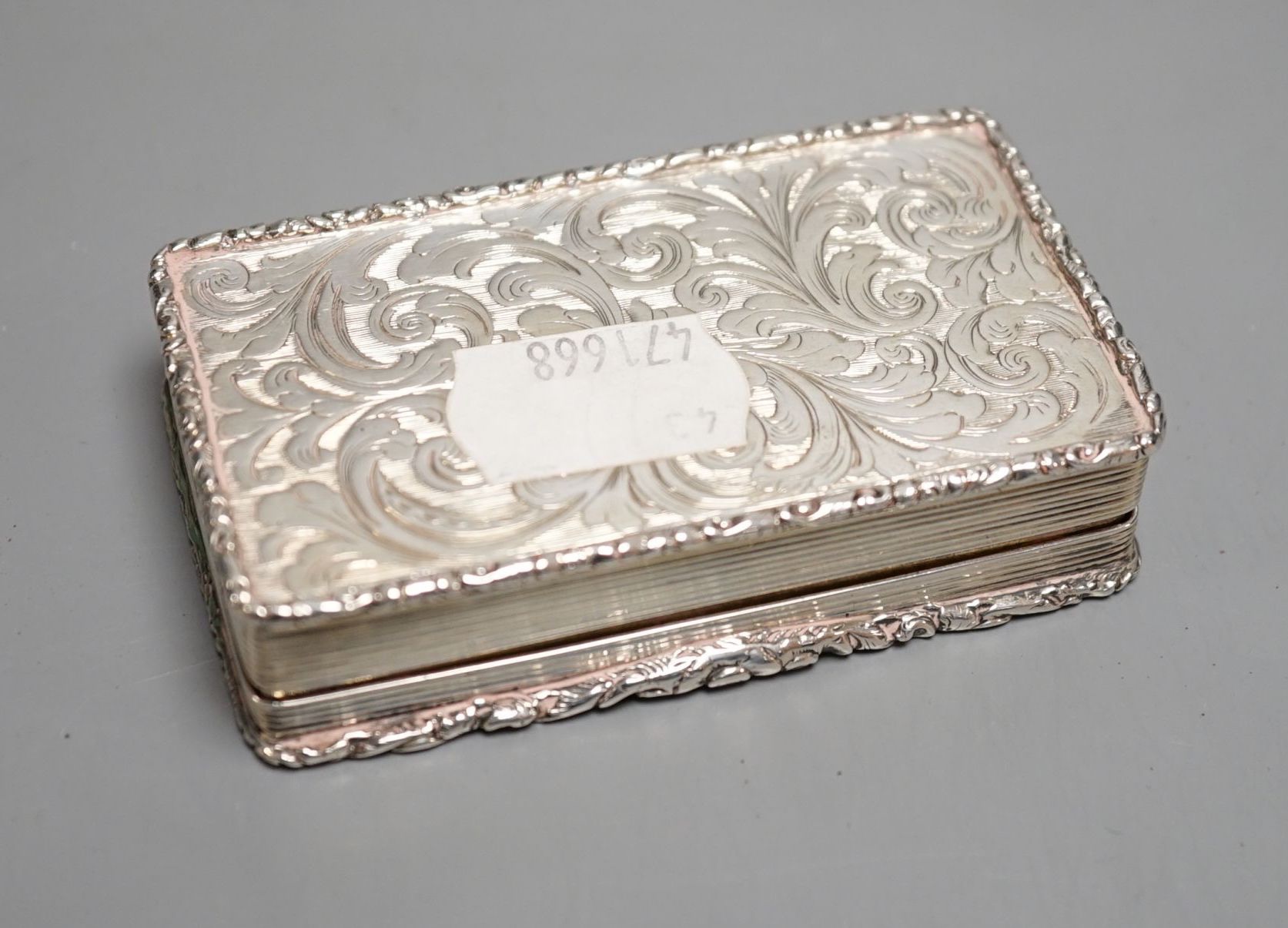 An early Victorian silver rectangular snuff box, with interior presentation inscription, Francis Clark, Birmingham, 1842, 82mm.